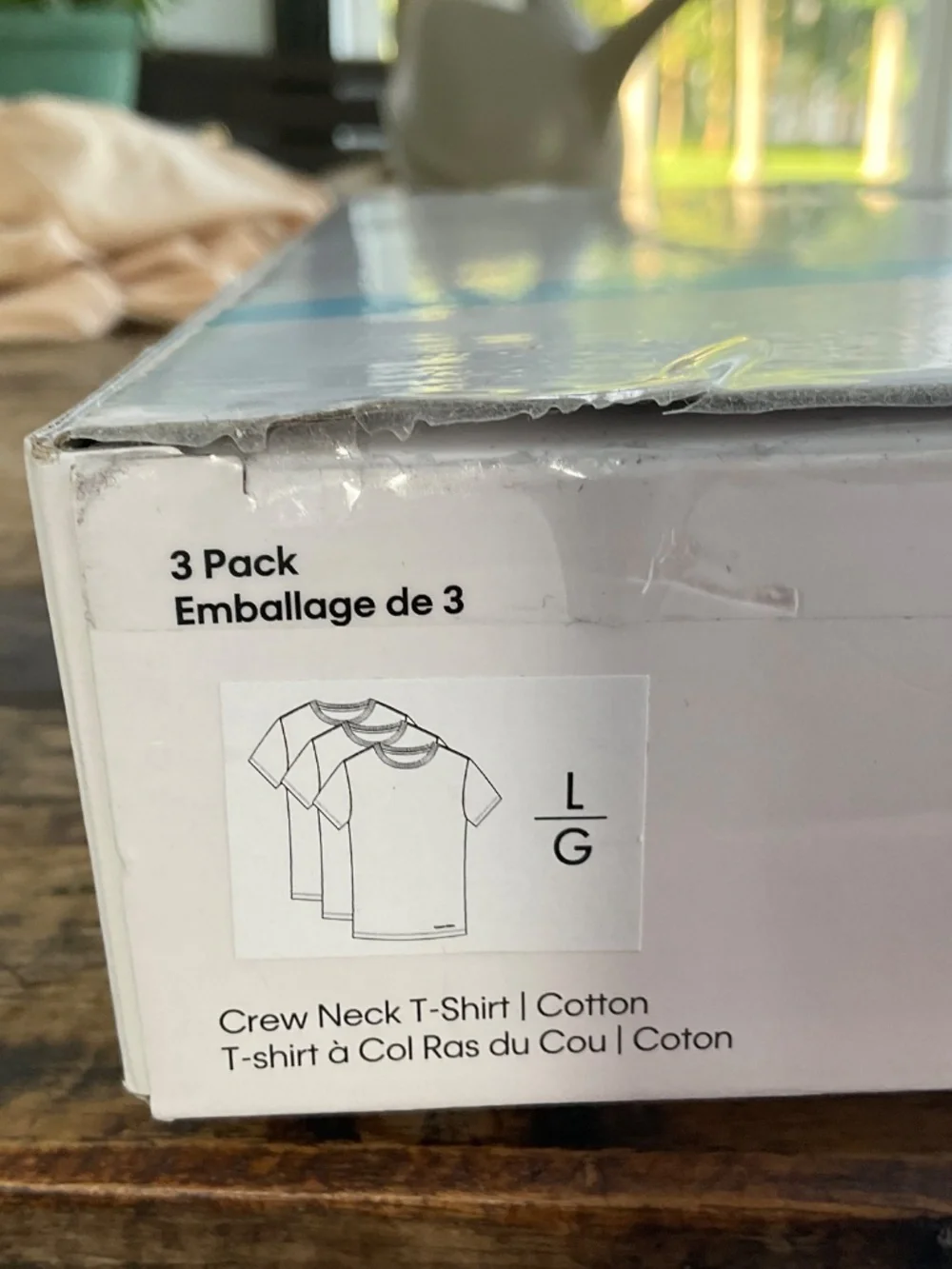 Calvin Klein white tee shirts,new in box.L.